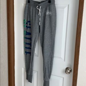 Seahawks joggers.